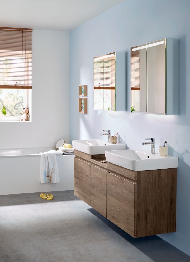 Renova Plan bathroom with two washbasins including washbasin cabinets and low cabinet in hickory